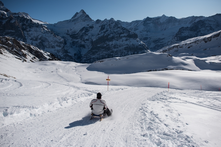 The Jungfrau region is home to more than 20 sledge runs. In this photo, a sledger rides along another run near Grindelwald.