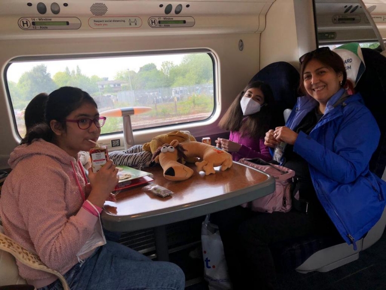 Katherine and two daughters on train