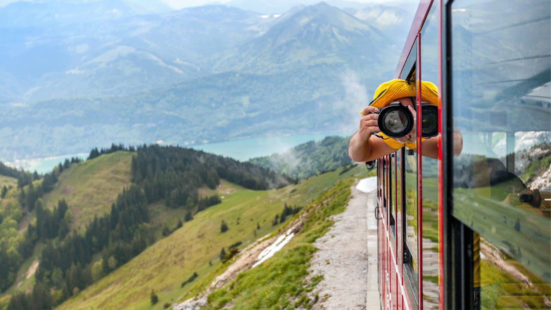 austria-alps-train-man-taking-picture