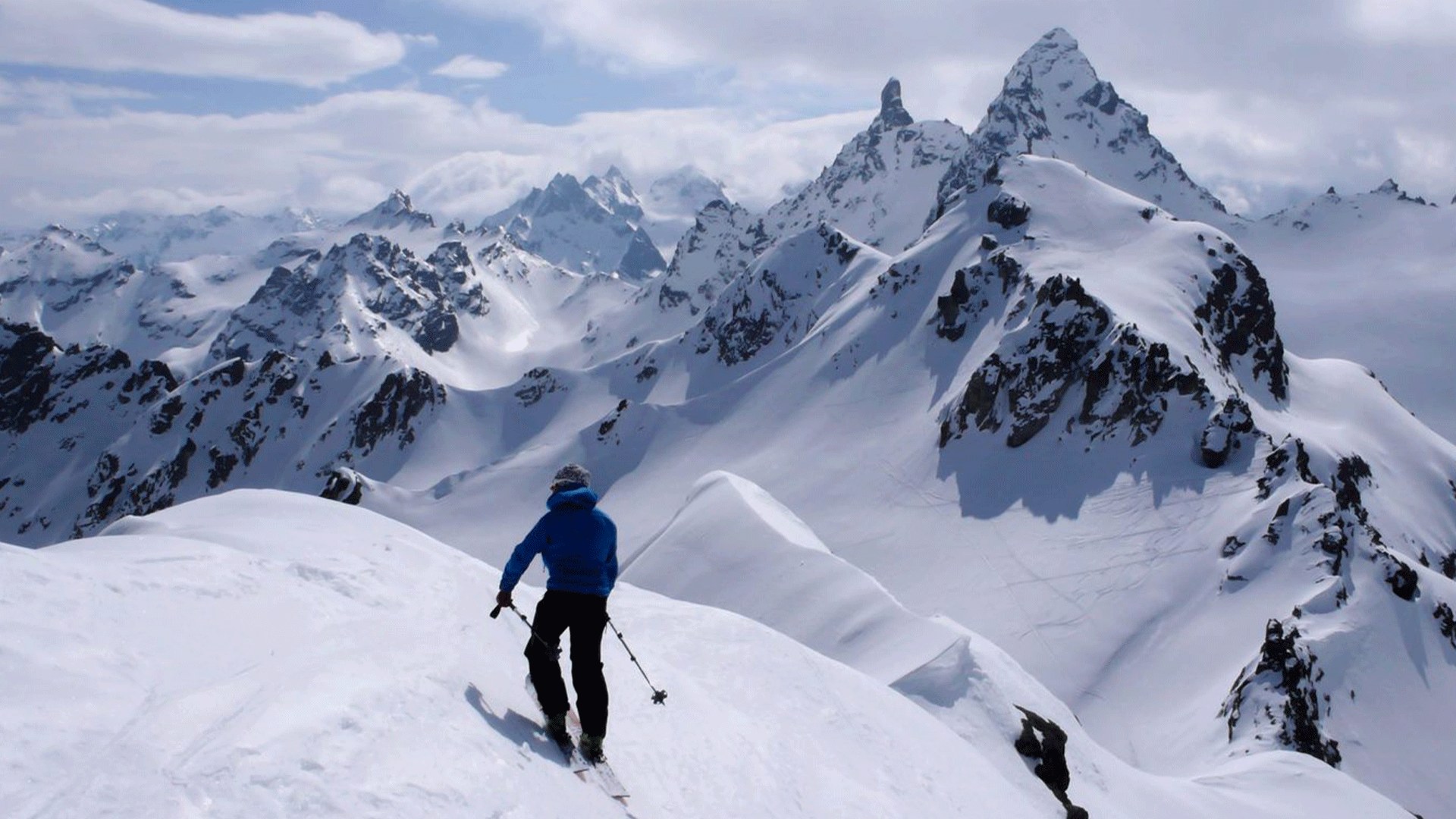 austria-silvretta-alps-skier-mountain-header