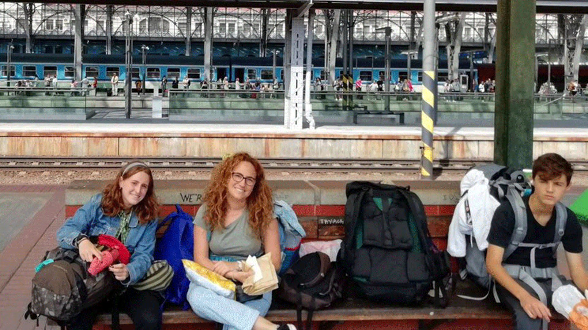 backpacking-family-train-station