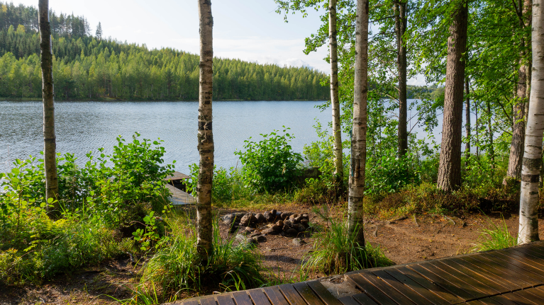 finland-lake-cottage-view-of-lake-and-fire-pit-shannen