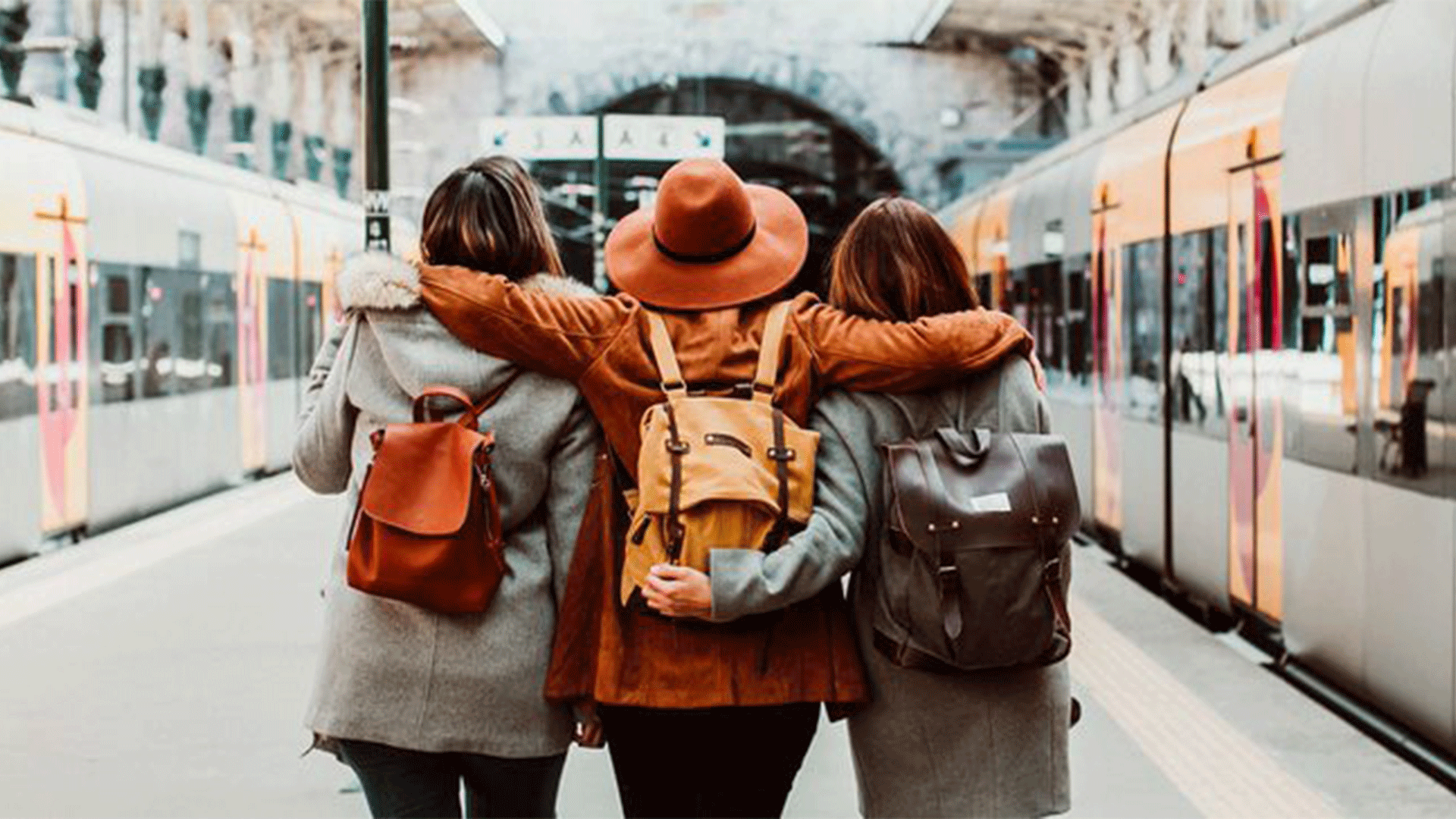 group-of-friends-at-train-station