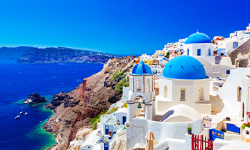 greece-santorini-blue-rooftops-panorama