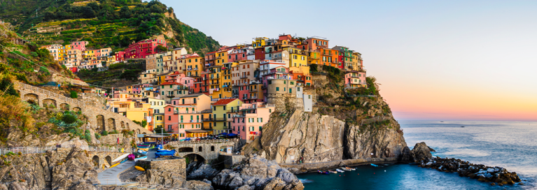 italy-manarola-cinque-terre-sunset-panorama-masthead