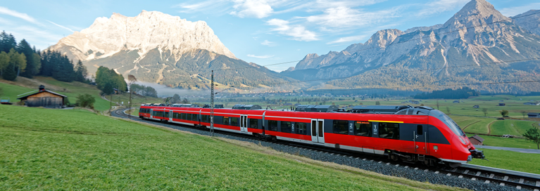 masthead-austria-mountains-train-in-valley