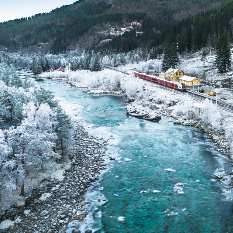 square-norway-bergen-railway-in-winter-river-tracks