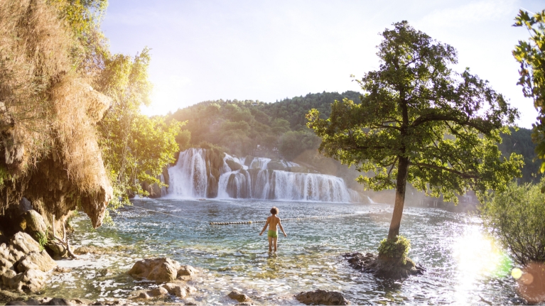 croatia-krka-naatinoal-park-waterfalls-man-bathing